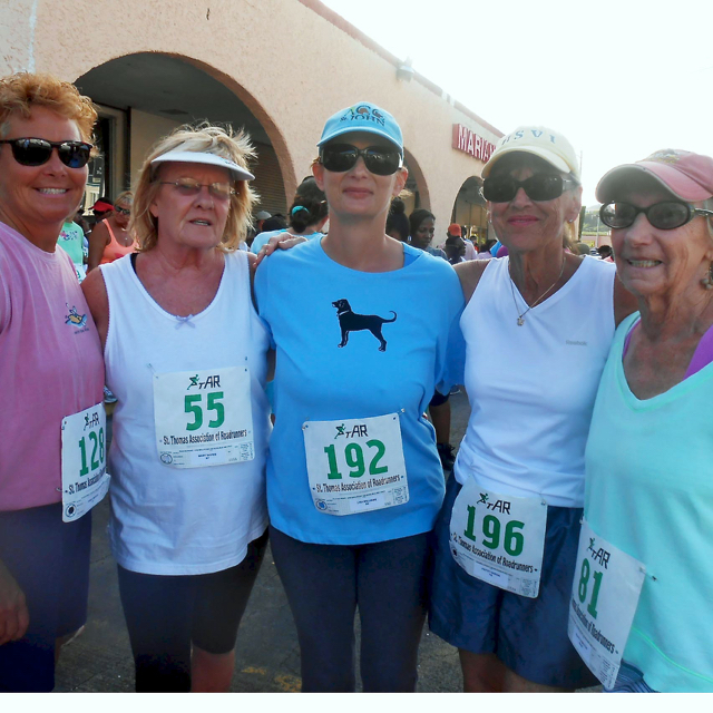 From left, Pam Morose, Mary Davies, Lisa Williams, Patty Vargas and Hillary Hamilton represented the Humane Society in Sunday's run.