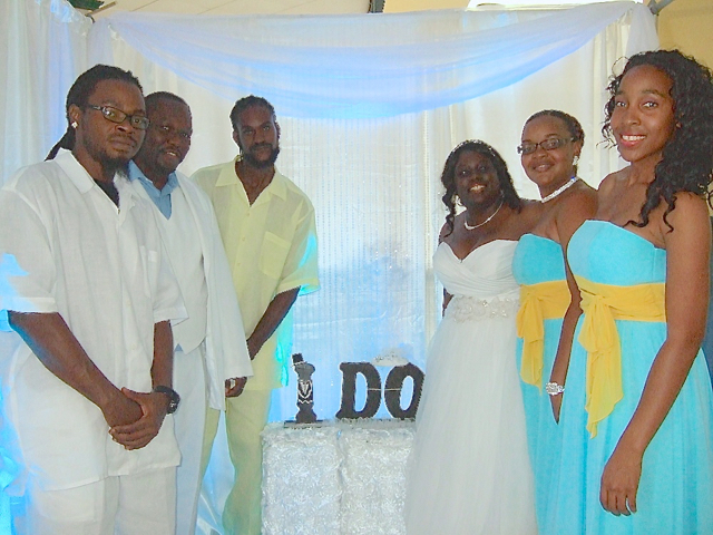 Nicole and Antonio Garvey and their wedding party participated in the Wedding Expo at Sunshine Mall. From left: Keithley Parris, Antonio Garvey, Kamal Fawkes, Nicole Garvey Clorecia Adams and Shantell Adams.