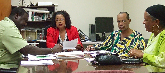 From left, Board of Elections members Raymond Williams, Lilliana Belardo de O'Neal, Glenn Webster and Lisa Harris-Moorhead meet Wednesday.