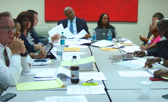JFL board members and staff listen to reports at Saturday's meeting.