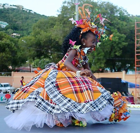 T'kajrah Wharton, shown here in the cultural/madras wear competition Sunday, was named 2015 Carnival Princess.