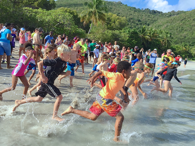 The first set of swimmers hit the water for the Rotary Club of St. Thomas Sunrise annual Kids Triathlon. (Ananta Pancham photo)