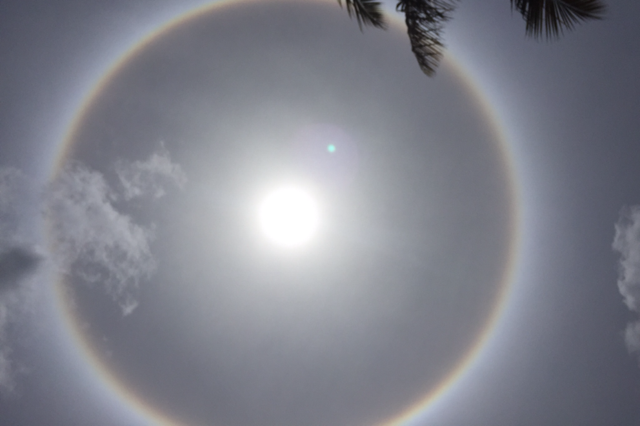 Sunlight and ice crystals in the upper atmosphere interact, creating a spectacular solar halo.