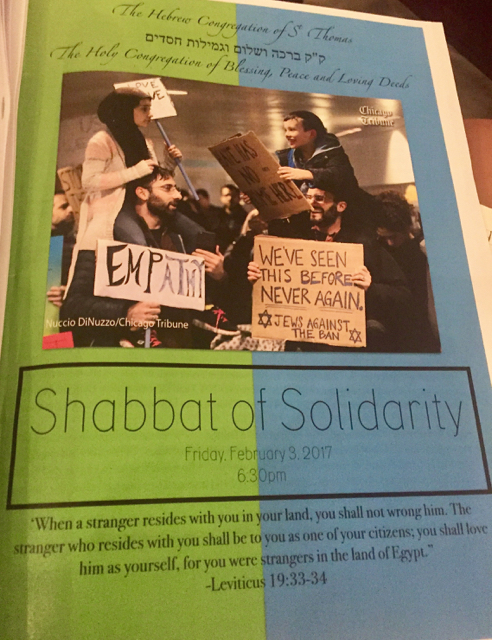 The program for the 'Shabbat of Solidarity' featured a well-circulated photo published in major newspapers in the week after the immigration ban was announced..