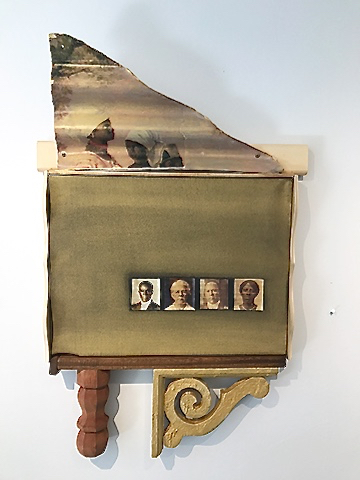 A mixed media piece, 'The House that Sugar Built,' incorporates photos and found objects. (Photo provided by Janet Cook-Rutnik)