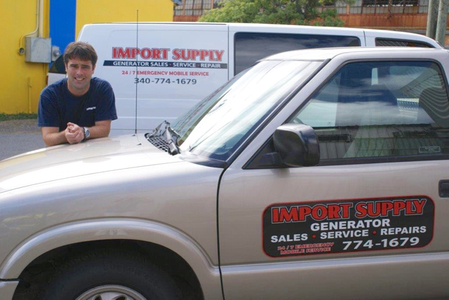 Mark van den Driessche shows off some of the fleet that keeps Import Supply serving energy customers on St. Thomas. (Photo by Charlotte Wardell)