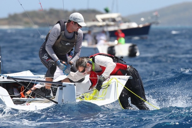 A sailor is helped back aboard after going in the drink (photo courtesy of Ingrid Abery).