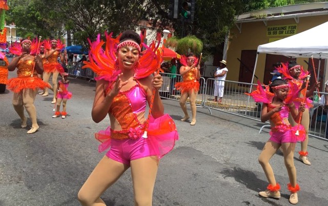 Kiani Ottley helps bring the St. Croix Majorettes up the parade route.