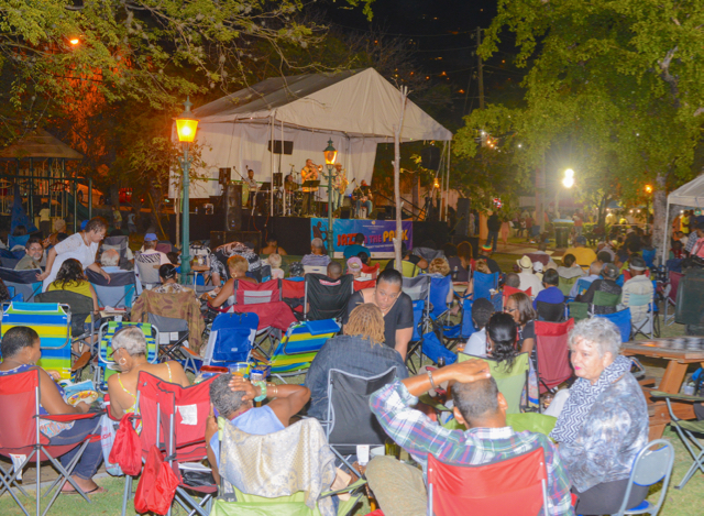 Hundreds of community members gather in Roosevelt Park for the concert and other activities. (Photo provided by ICMC)