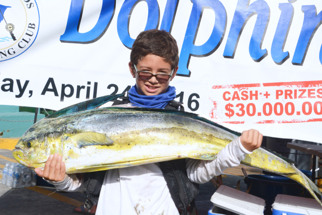 9-year-old Robbie Richards holds his winning catch at the 21st Annual Dolphin Derby. (Photo by Dean Barnes)