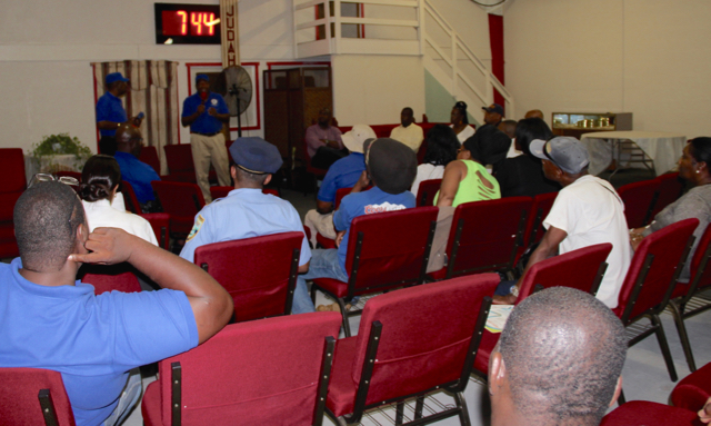 Community members come together during a CAPA meeting to discuss a gun violence ceasefire. 