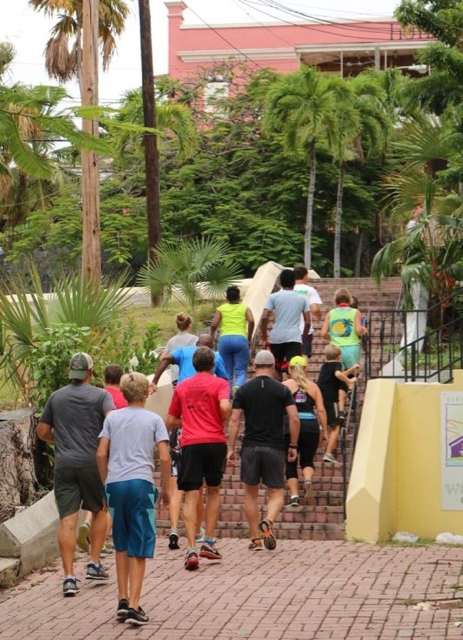 Runners begin the race with the steps leading up to Government Hill.