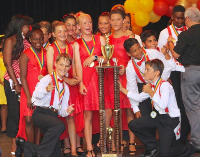 Antilles School celebrates its first place win Saturday. (Ananta Pancham photo)