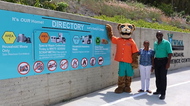 The Litter Critter, Laverne Ragster and WMA&rsquo;s Mario Leonard help open the agency&rsquo;s Mandahl convenience center Saturday.