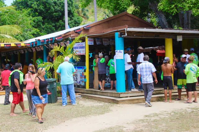 Crowds gather at Hull Bay Hideaway to socialize ar the end of the tournament.