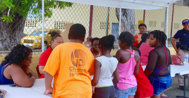 Children register to participate in the festivities at the Winston Raymo Recreation Center on St. Thomas.