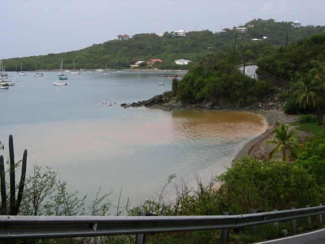 After a heavy rain, a runoff plume clouds Coral Bay, St. John. (Photo by Gary Ray)