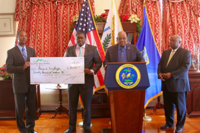 From left, Attorney General Claude Walker, Alpine Securities&rsquo; Jason Charles, VIPD Commissioner Delroy Richards and Gov. Kenneth Mapp announce the addition of $20,000 to the reward for the capture and arrest of the toddler&rsquo;s killer.
