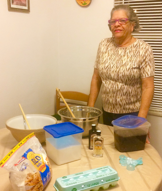 Nilda Colon Millin assembles ingredients for her holiday sweet breads. (Photo by Laney Millin)