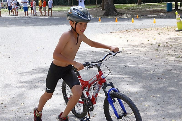 Taber Helton sets out on the bike course Saturday in the fourth Rotary Sunrise Kids Triathlon.