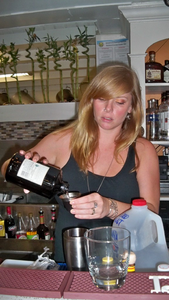 Erica Wasik creates a cocktail.