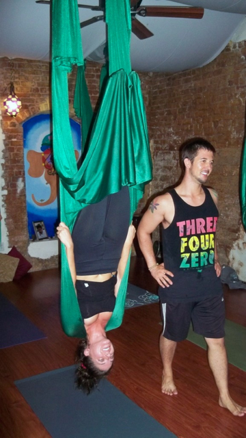 Meghan Monokian hangs in an inversion, coached by instructor Paul Beamer.