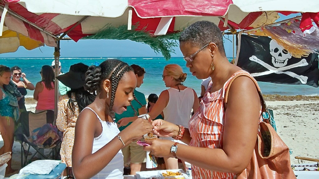 Sydney Cornwall,10, and Frances Benjamin enjoying Pirate's Booty chili. 