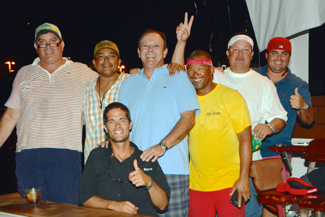 Celebrating taking the lead, Reef Affair's team, from left, Wilson Culberg, Capt. Jose Garcia, Carlos Ramirez, Obilino Espinal, Michael Laporte, Jose Culberg, and in front, Gabriel Hernandez. (Photo by Dean Barnes)
