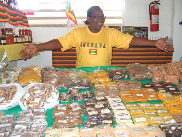 Margaret Roberts from Grenada welcomes the public to her booth filled with spices, herbs, essences and sweets.