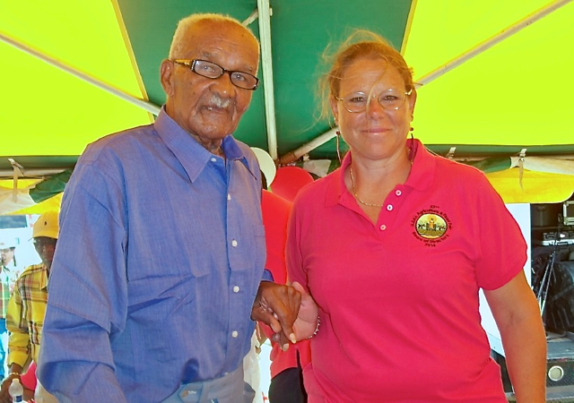 John 'Johnny' Tranberg, with director of livestock exhibits Sue Lakos, was honored at Saturday's Ag Fest opening ceremonies.