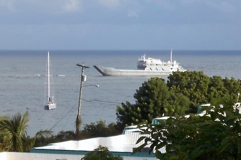 MV Commander sits on Round Reef Saturday morning before it was refloated.