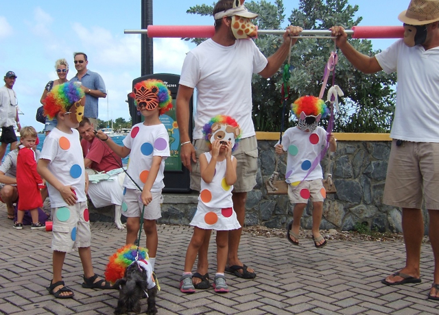 'Afro Circus' kids and adults won first place at Krewe de Barkus parade Saturday with Oreo, the dog.
