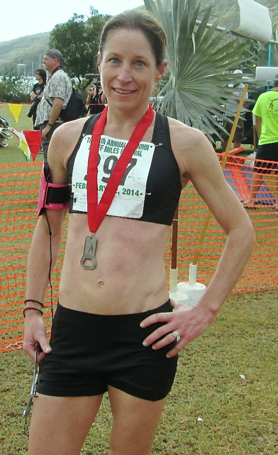 Women's winner Jessica Rice poses with her medal.