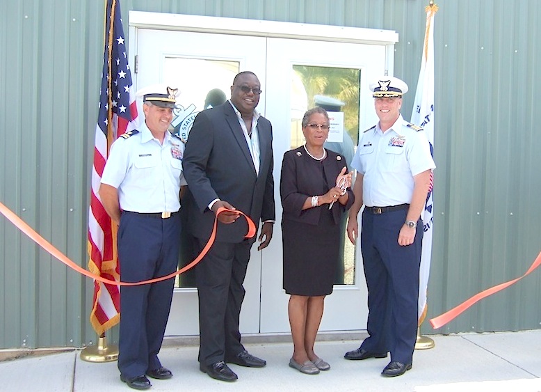 Lt. Roger Bogert, Raymond Williams from the Governor's Office, Delegate Donna Christensen and Capt. Drew Pearson, commander of the U.S. Coast Guard Sector San Juan cut the ribbon at the new Coast Guard facility on St. Croix.