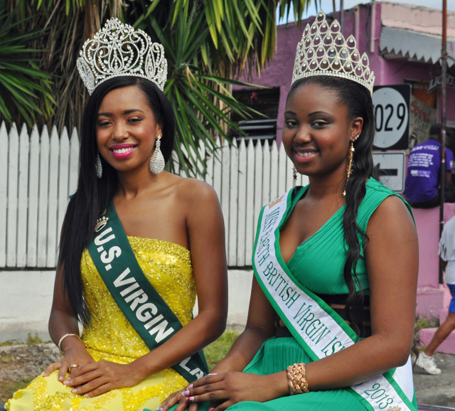 Miss U.S. Virgin Islands Vanessa Donastorg, left, and Miss Earth from the BVI, Kimberly Herbert, ride in the Adult Parade.