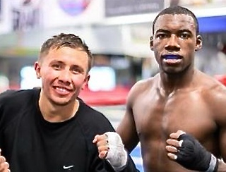 Julius Jackson with champion fighter Gennady Golovkin. Jackson trained with Golovkin for several weeks at Big Bear, Calif.