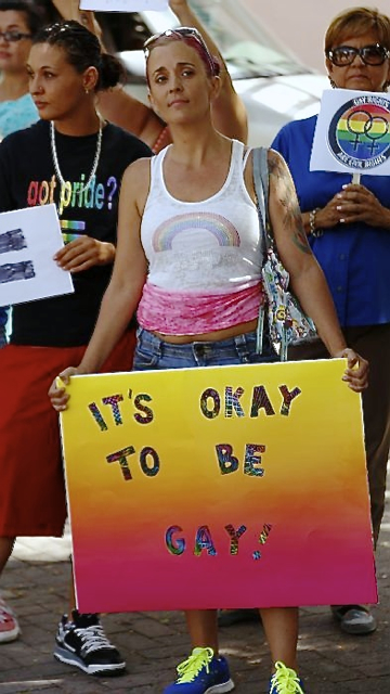 Sarah Mackie shows her support for Sen. Judi Buckley's bill during the One Voice event.