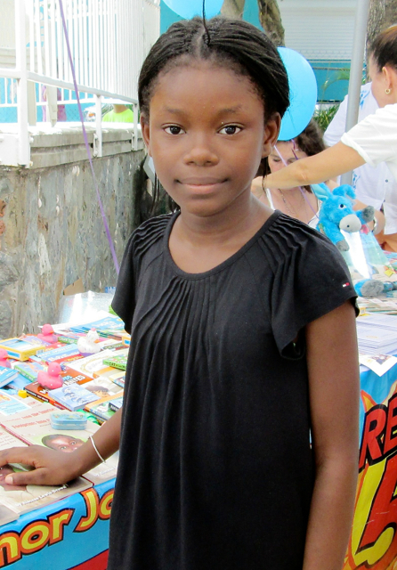 St. Thomas resident Chenayah Thomas, 11, said reading helps her learn. 