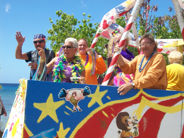 The Krewe de Croix committee rides down the Mardi Croix parade route in Cane Bay.