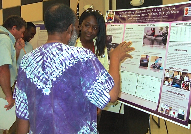Jamila Martin explains her project on the Salt River bioluminescent mangrove at Saturday's UVI Research Symposium.