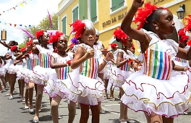 Joseph Gomez Elementary School students entertained in the 2013 Children's Parade with its 'Gems in Paradise' troupe. (File photo)