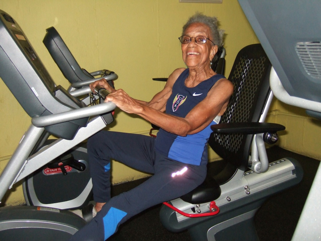 Ida Keeling works out on an exercise bike. This summer she'll be 99 and aims to break her world record for the 60-year dash.