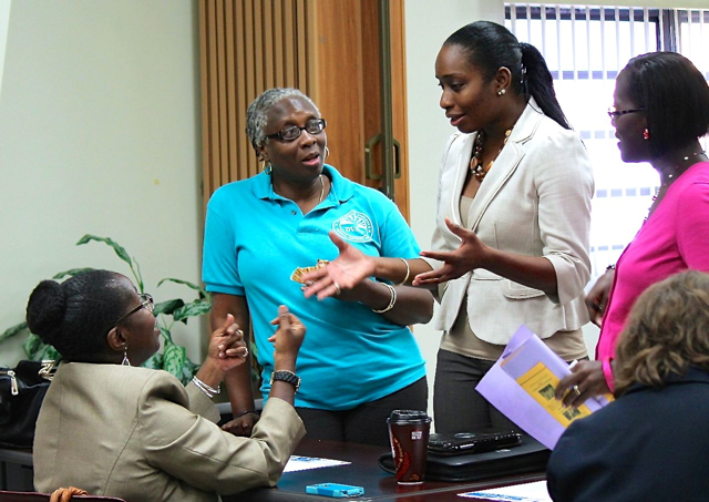 From left: Family Resource Center's Vivian St. Juste, DVSAC's Jeanette John-Baptiste, YWCA's Donnalie Cabey and VIPD's Dr. Naomi Bellot, exchange information on their youth services.