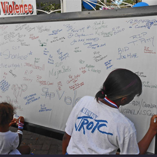 Kids write on memory board.