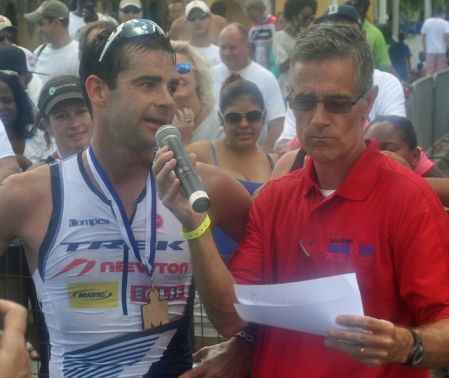 Timothy O’Donnell addresses the crowd after winning the Captain Morgan’s St. Croix Ironman 70.3 Triathlon Sunday.