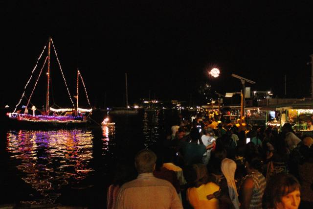 The festive crowd watches as fireworks begin, capping the annual Chrstiansted Christmas Boat Parade.