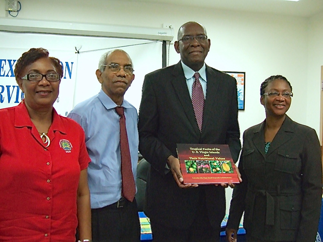 From left, Clarice Clarke, Kwame Garcia, UVI President David Hall and Dr. Letitia Henry introduce 'Tropical Fruits of the U.S. Virgin Islands and Their Nutritional Values'  at a book release event Wednesday.