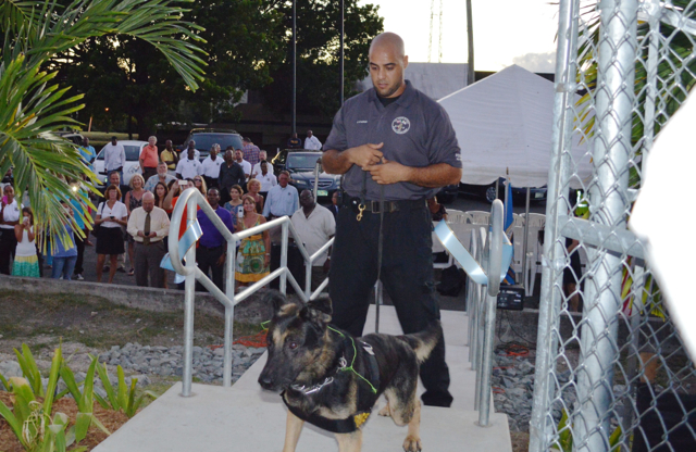 VIPD K-9 Master Trainer Jason Viveros and his canine partner cut the ribbon on St. Croix's new K-9 facility Tuesday