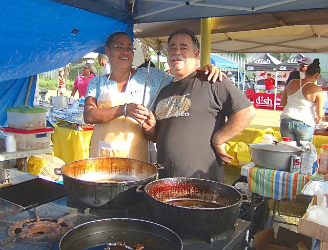 Ana Quinones and Jaime Felix cook pates, alcapurria, fried chicken and bacalaitos Sunday for VIPR Friendship Fiesta. (Susan Ellis photo)