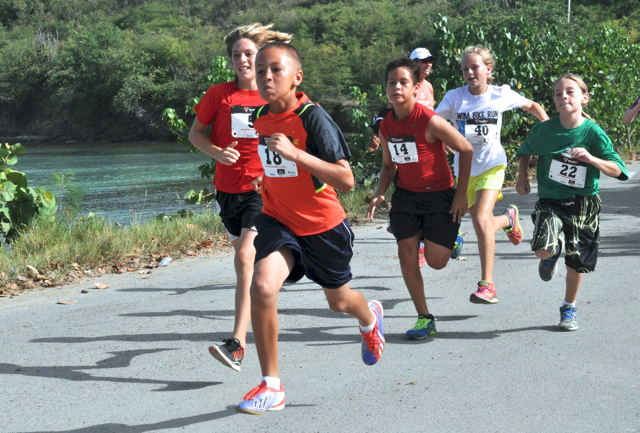 Masse Hatcher leads the first leg of the 9- and 10-year-old athletes. (Theresa Harper photo)
